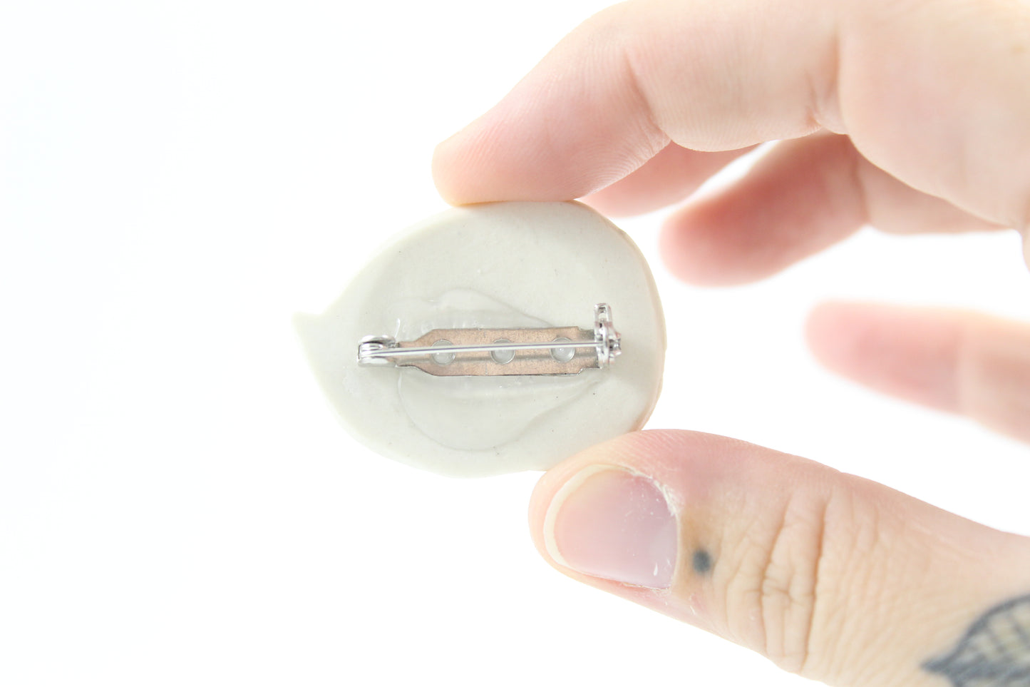 Snail shell pin
