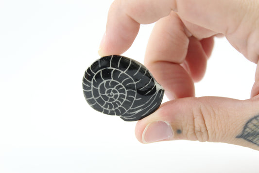 Snail shell pin
